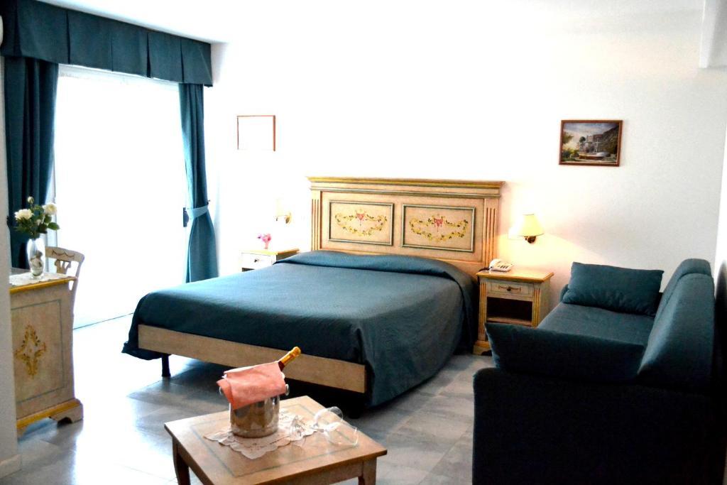 Hotel Oasi Lignano Sabbiadoro Szoba fotó