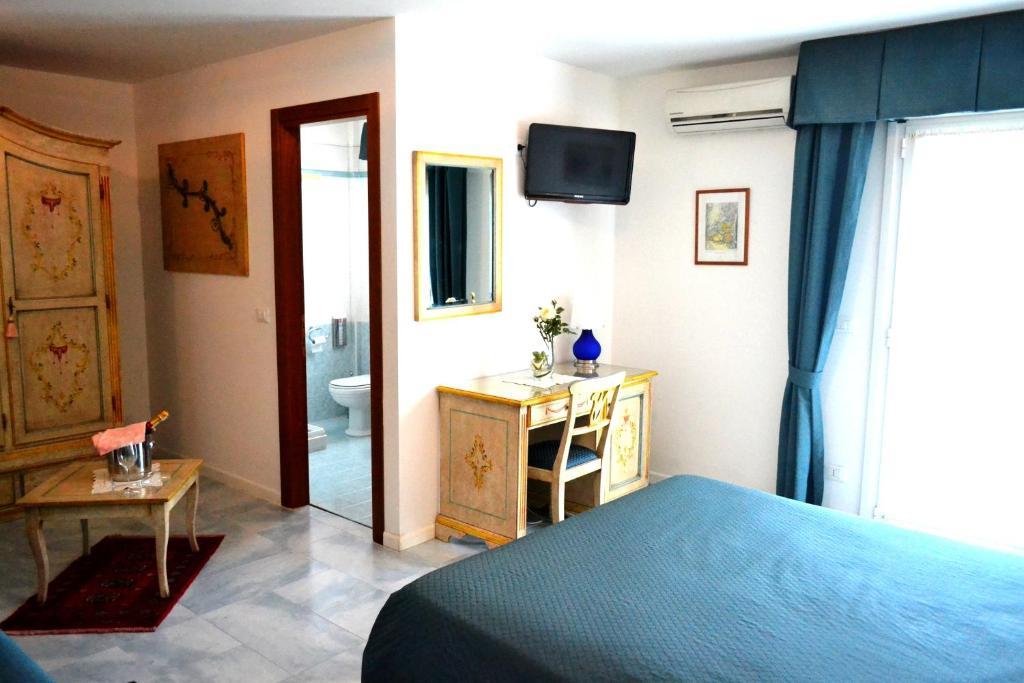 Hotel Oasi Lignano Sabbiadoro Szoba fotó